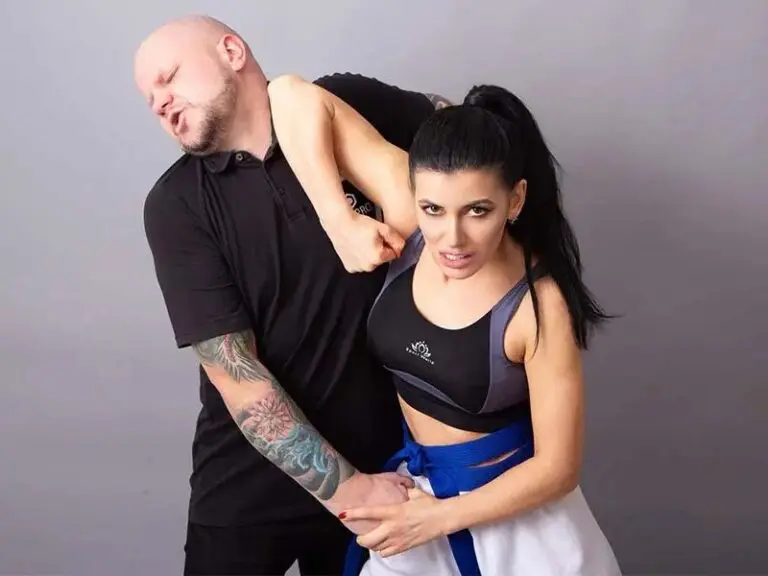 female self defense student showing techniques